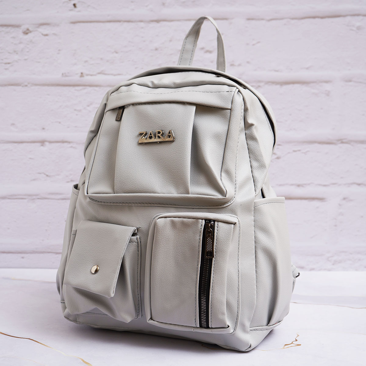 کوله پشتی چرم زنانه طوسی مدل ZARA