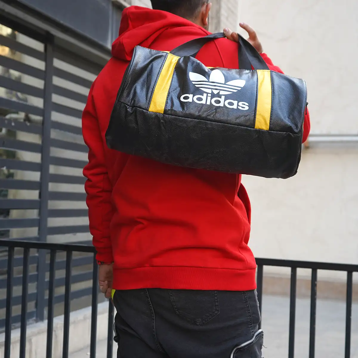 کیف ورزشی آدیداس مشکی زرد مدل Soren