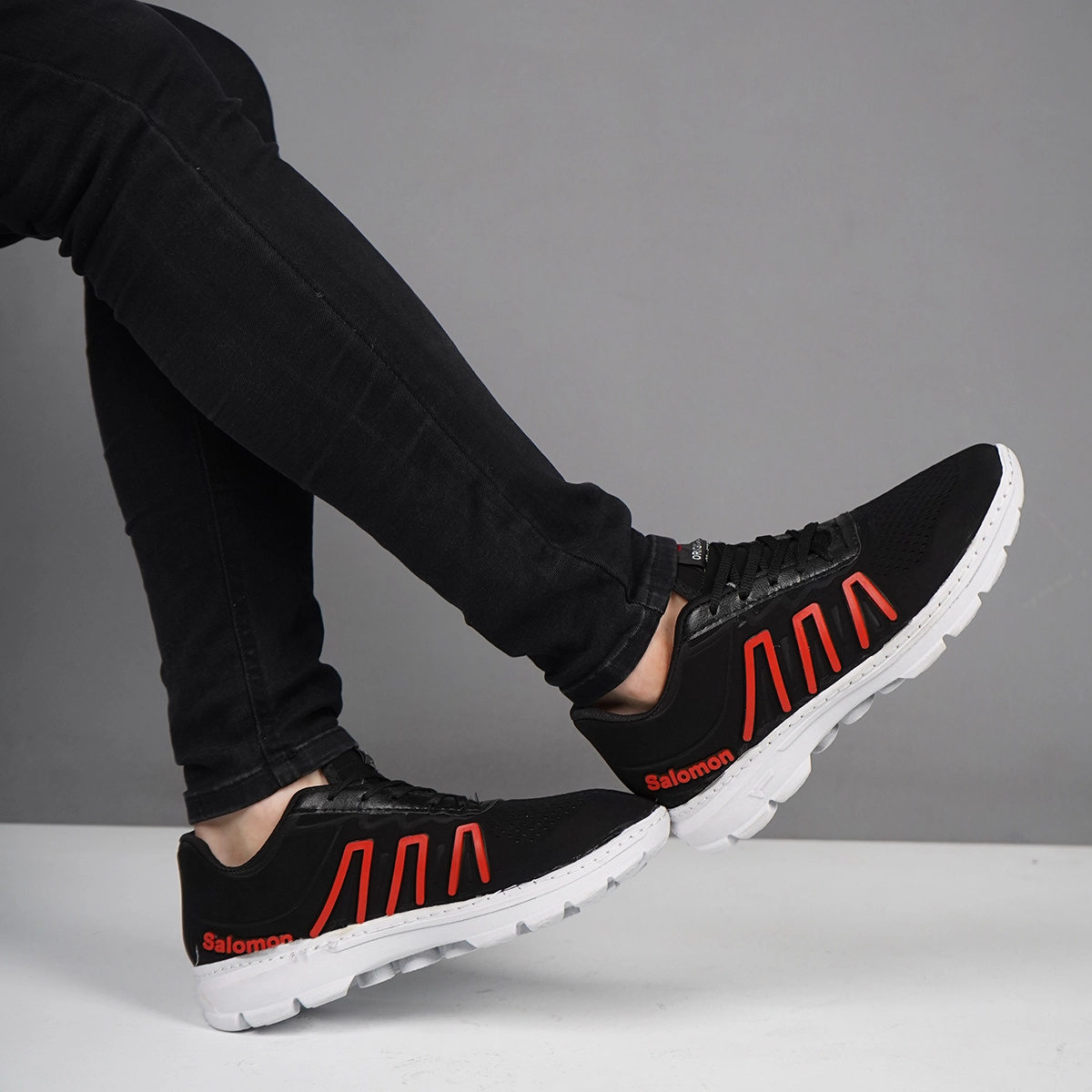 کفش ورزشی مردانه سالامون مشکی قرمز مدل U200