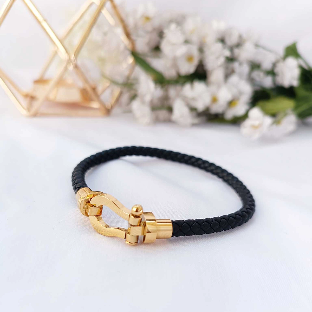 دستبند اسپرت امگا مشکی طلایی